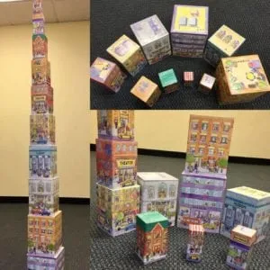 Picture stacking blocks shown in a tall tower, nested, and arranged as a town