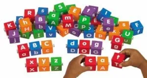 Letter blocks snapped together to spell simple words like dog and cat