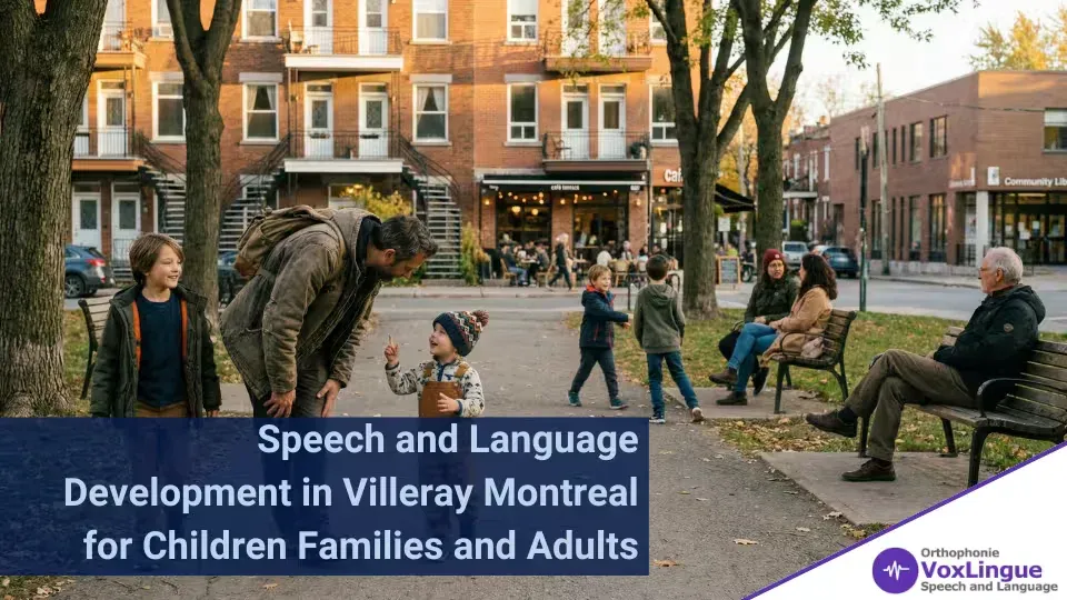 Father crouching to listen to a pointing toddler in a neighbourhood park, with families and a senior on benches